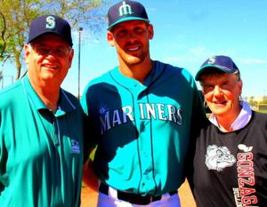 Seattle Mariners relief pitcher Nick Hagadone, a Sandpoint native, poses for a photo with Bill and Marianne Love at spring training in Peoria, Ariz. (Slight Detour blog photo)
