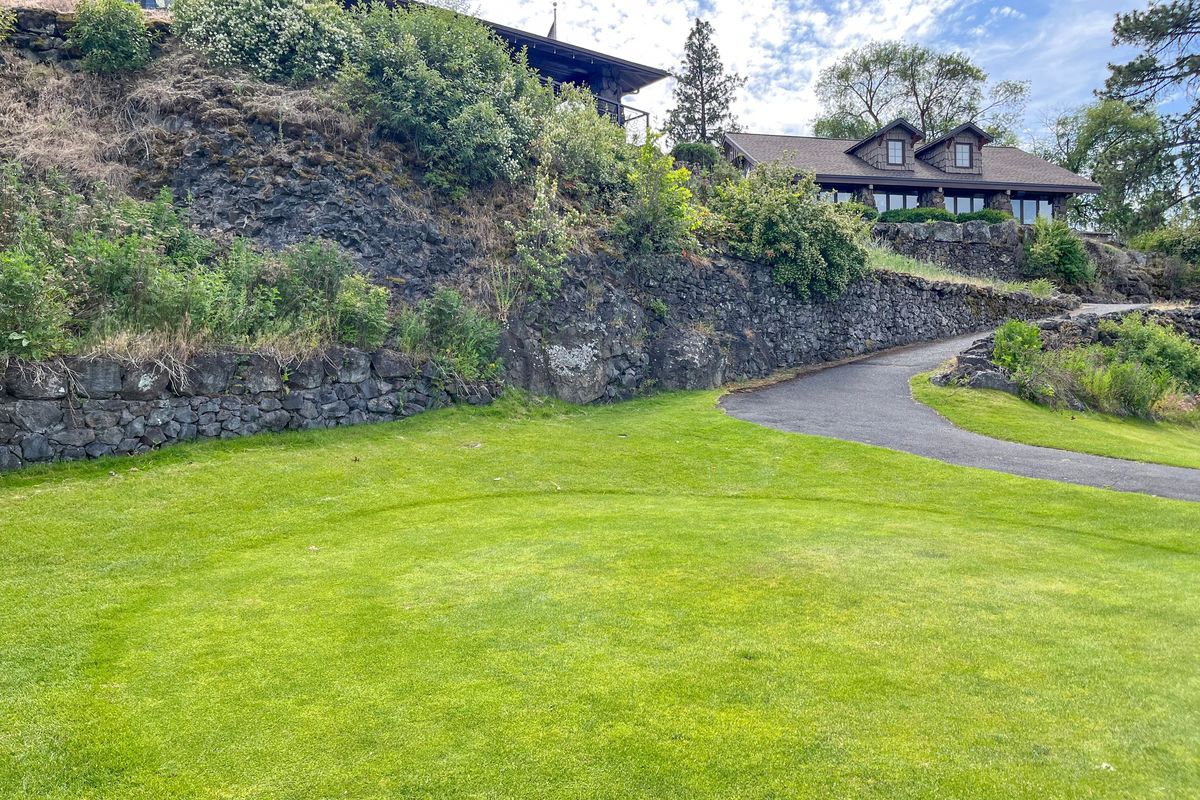Present day: The pro shop and clubhouse look down on tee boxes on the slopes of the Indian Canyon Golf Course, which opened to the public in 1935. During the match in early 1936 between U.S. Army officers and Native Americans from the Nespelem, Wash., area, newspaper stories mentioned that the course was the site of Native American villages in presettler times. The hilly 6,255-yard course is often mentioned as one of the top public courses in the United States. (Jesse Tinsley/THE SPOKESMAN-REVIEW)