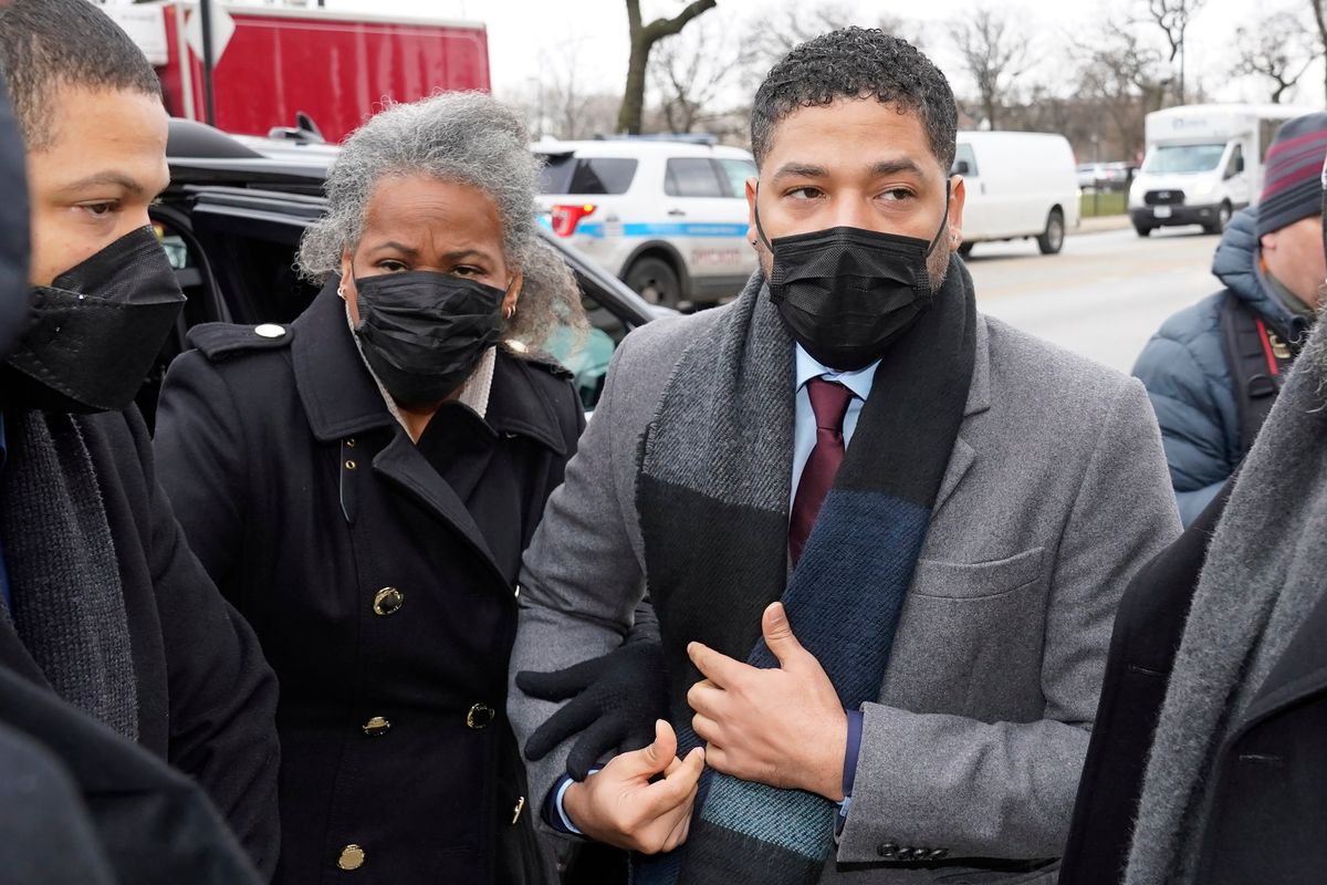 Actor Jussie Smollett arrives Monday, Dec. 6, 2021, with his mother Janet at the Leighton Criminal Courthouse for day five of his trial in Chicago. Smollett is accused of lying to police when he reported he was the victim of a racist, anti-gay attack in downtown Chicago nearly three years ago, in Chicago.  (Charles Rex Arbogast)