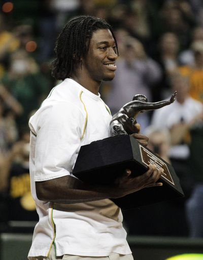 There’s not much to dislike about Baylor’s Heisman Trophy quarterback, Robert Griffin III. (Associated Press)