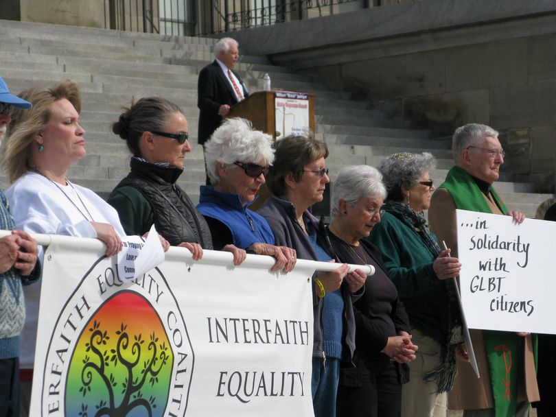 Two events on the state Capitol steps at the same time: a prayer vigil for the GLBT, and a candidate announcement for the Idaho Supreme Court (Betsy Russell)