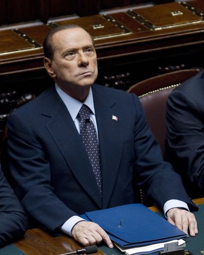 Italian Premier Silvio Berlusconi attends a voting session at the Chamber of Deputies on Tuesday. (Associated Press)
