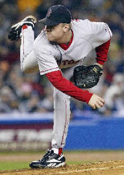 
Red Sox ace Curt Schilling held the Yankees to one run in his seven-inning stint on Tuesday night. 
 (Associated Press / The Spokesman-Review)