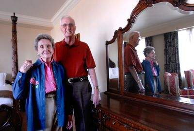 Louise and Roy Hipperson stand in their room at the Davenport Hotel on  Sept. 3. The Hippersons spent their wedding night at the same hotel 60 years ago.  (KATE CLARK / The Spokesman-Review)