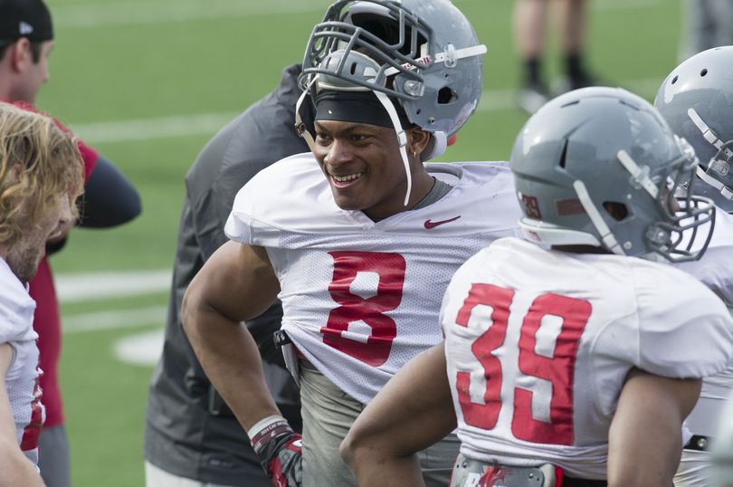 WSU linebacker Jeremiah Allison, right, knows things are a little edgy when it comes to the Apple Cup rivalry.  (Tyler Tjomsland)