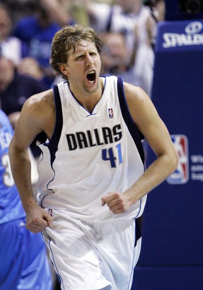 Dirk Nowitzki and Mavs charge back to avoid elimination.  (Associated Press / The Spokesman-Review)