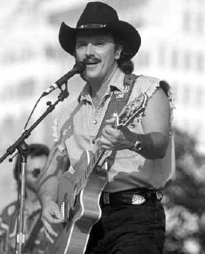 
Former HealthSouth CEO Richard Scrushy performs with his country group Dallas County Line in this June 19, 1995, file photo taken in Birmingham, Ala. The country band hired professional backing musicians and produced two recordings. One featured the 1995 song 