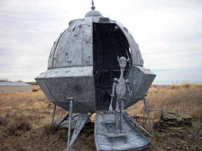 
Mike Ferguson has this alien and space craft for sale at his business north of Interstate 90, just west of Exit 272. 
 (JENNIFER LARUE / The Spokesman-Review)