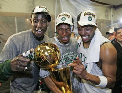 
Boston's Kevin Garnett, left, Ray Allen, center, and Paul Pierce celebrate the first NBA championship of their careers. Associated Press
 (Associated Press / The Spokesman-Review)