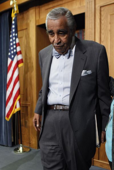 House Ways and Means Committee Chairman Charles Rangel leaves after making his statement on Capitol Hill on Wednesday.  (Associated Press)