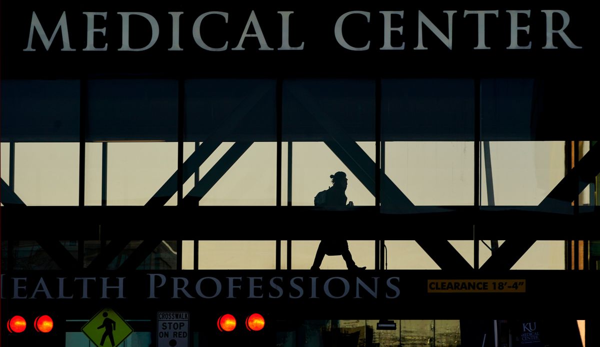 A person walks between buildings at the University of Kansas Hospital on Jan. 28 in Kansas City, Kan.  (Charlie Riedel)