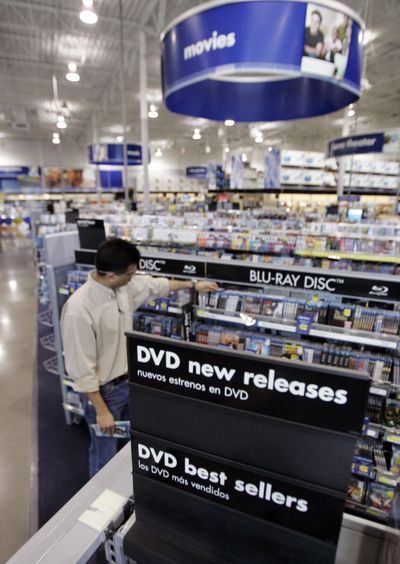 A customer looks at DVDs at Best Buy in Mountain View, Calif.  (Associated Press / The Spokesman-Review)