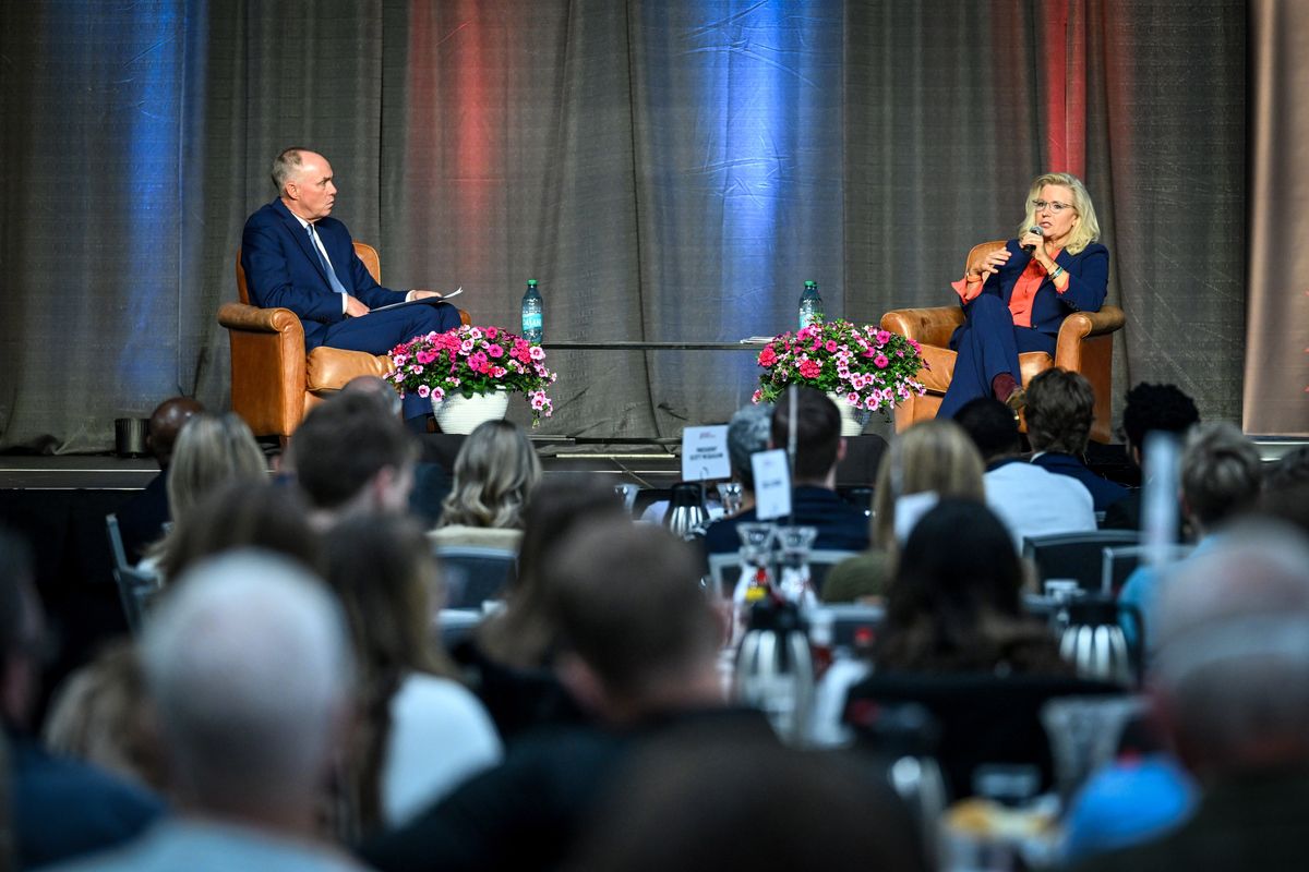 Former U.S. Rep. Liz Cheney, right, answers questions from Whitworth President Scott McQuilkin during a morning gathering Wednesday at the Spokane Convention Center as part of the Whitworth University President’s Leadership Forum. Cheney served in Congress from 2017 to 2023 and voted, the second time, to impeach President Donald Trump. After losing her seat in the primary in 2022, Cheney campaigned for Kamala Harris in the 2024 presidential race against Trump.  (Jesse Tinsley/THE SPOKESMAN-REVIEW)