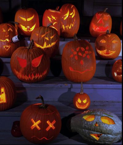 FILE - Halloween jack-o' lanterns. (JIM COLE / AP)