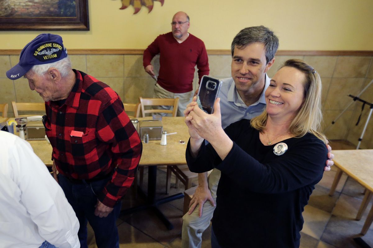 In this Sunday, Jan. 7, 2018, file photo, Texas Democratic Congressman Beto O’Rourke, second from right, poses for a photo following a town hall meeting at a restaurant in Falfurrias, Texas. For many Democrats, Beto O’Rourke’s response to a question about NFL players kneeling during the national anthem was the type of moment that will be essential for a field that will challenge President Donald Trump beginning after the November elections. If there’s a common buzzword in Democratic politics right now, it’s “authenticity,” or the desire to present candidates in an unvarnished manner that’s true to themselves. (Eric Gay / AP)