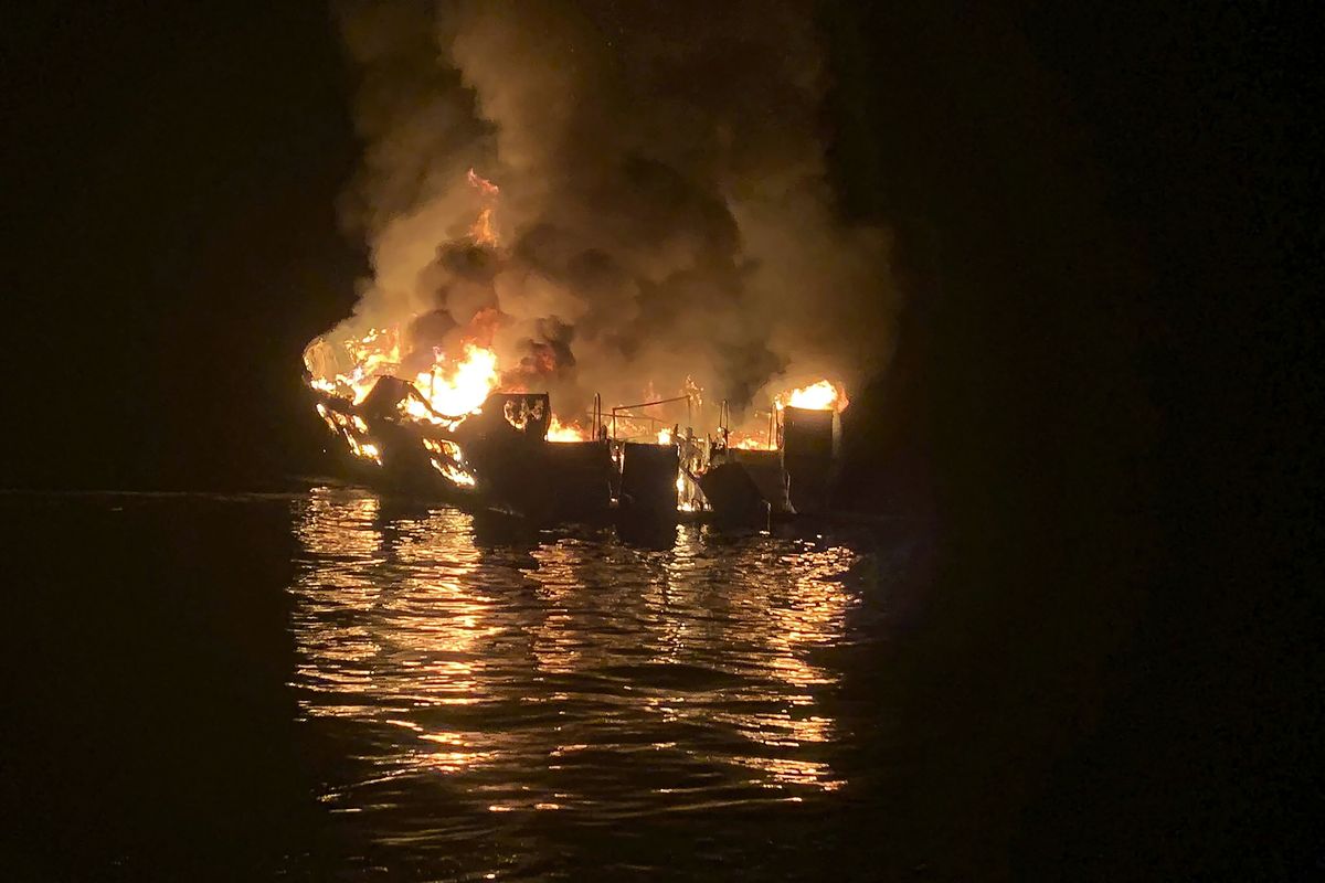 In this Sept. 2, 2019 photo provided by the Santa Barbara County Fire Department, the dive boat Conception is engulfed in flames after a deadly fire broke out aboard the commercial scuba diving vessel off the Southern California Coast. The captain of a scuba diving boat that burned and sank off the California coast, killing 34 people below deck, has pleaded not guilty to federal manslaughter charges. Jerry Boylan surrendered Tuesday, Feb. 16, 2021, and was arraigned in Los Angeles federal court on 34 counts of seaman