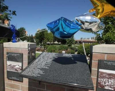 Blue, silver and gold star balloons flapped in the breeze above the granite plaques where names were freshly etched into the McEuen Park Donor Wall. (Devin Heilman/Coeur d'Alene Press photo)