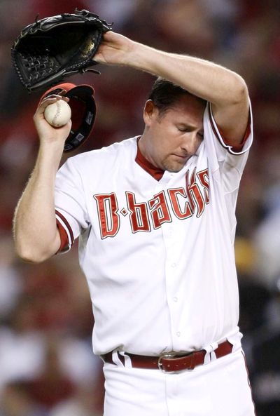 A sore right shoulder has sidelined Brandon Webb.  (Associated Press / The Spokesman-Review)