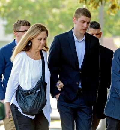 In this AP file photo from last Thursday, Brock Turner, right, makes his way into the Santa Clara Superior Courthouse in Palo Alto, Calif. A letter written by Turner's father was made public over the weekend by a Stanford law professor who wants the judge in the case removed from office because Brock Turner's sentencing. (Dan Honda/Bay Area News Group via AP, File)