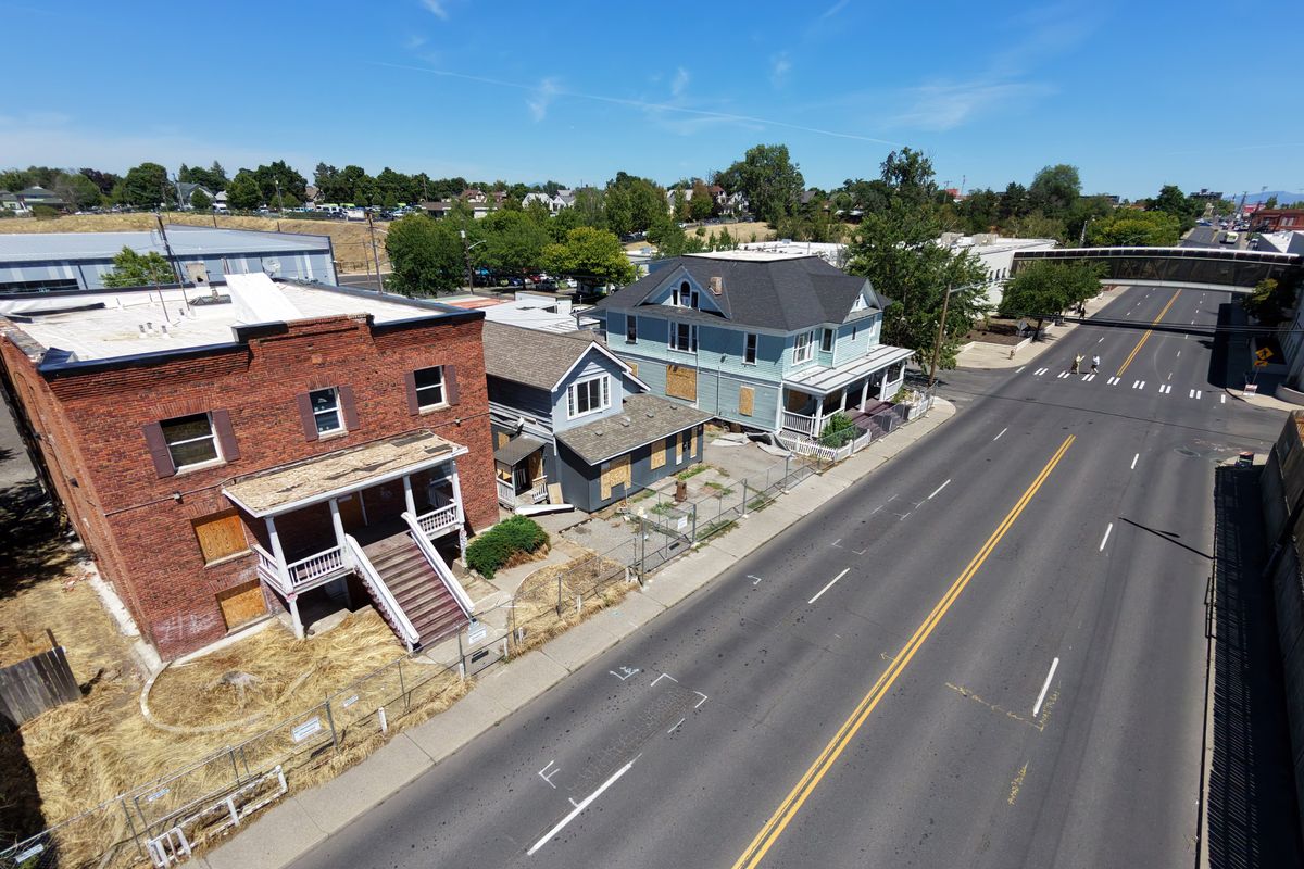 Spokane Transit Authority has purchased for more than $2 million the three properties on the north side of West Boone Avenue, opposite of STA’s main offices. The properties are intended for future development of more office space.  (Jesse Tinsley/THE SPOKESMAN-REVIEW)