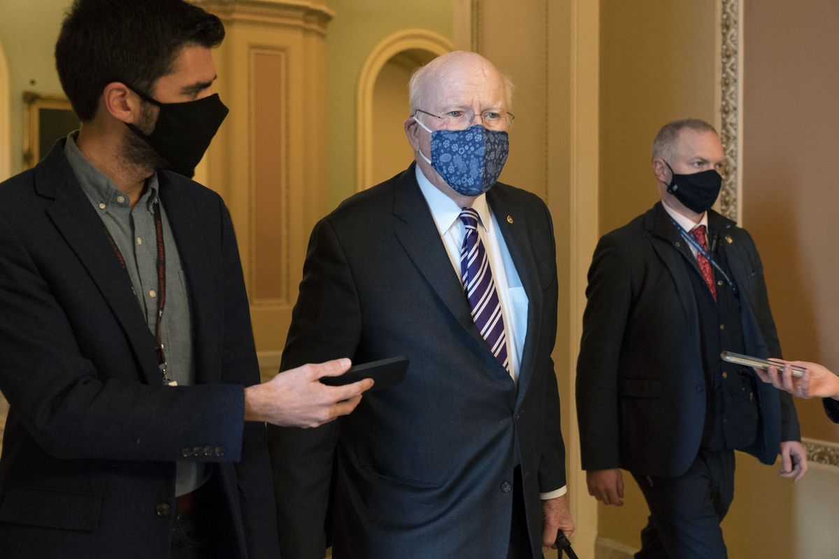 Sen. Patrick Leahy, D-Vt., walks with reporters, Tuesday, Jan. 26, 2021, as he leaves the Senate floor on Capitol Hill in Washington.  (Jacquelyn Martin)