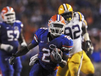 Florida running back Jeffrey Demps runs for a 42-yard TD in the second half on Saturday.  (Associated Press / The Spokesman-Review)