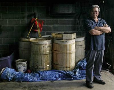 
Former Chevron station dealer Frank Young believes Hawaii's gas cap law, which is designed to prevent gas gouging and introduce more fairness in pricing at the pump, has led to lower prices.
 (Associated Press / The Spokesman-Review)