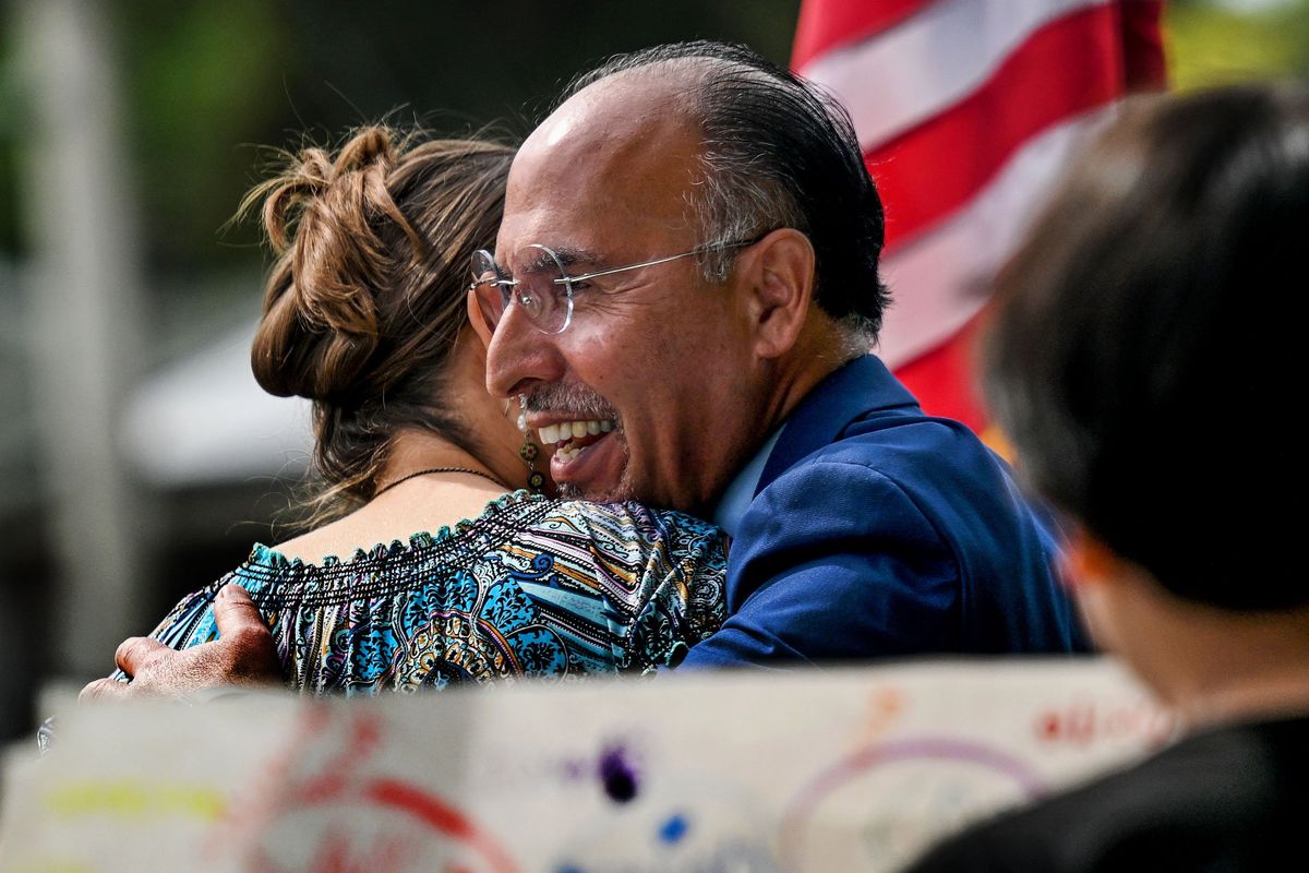 Ruben Trejo Dual Languange Academy Principal Mauricio Segovia gets a hug from Sarah Onosko, Parent Teacher Group president Thursday during the dedication ceremony on Thursday.  (Kathy Plonka/The Spokesman-Revie)
