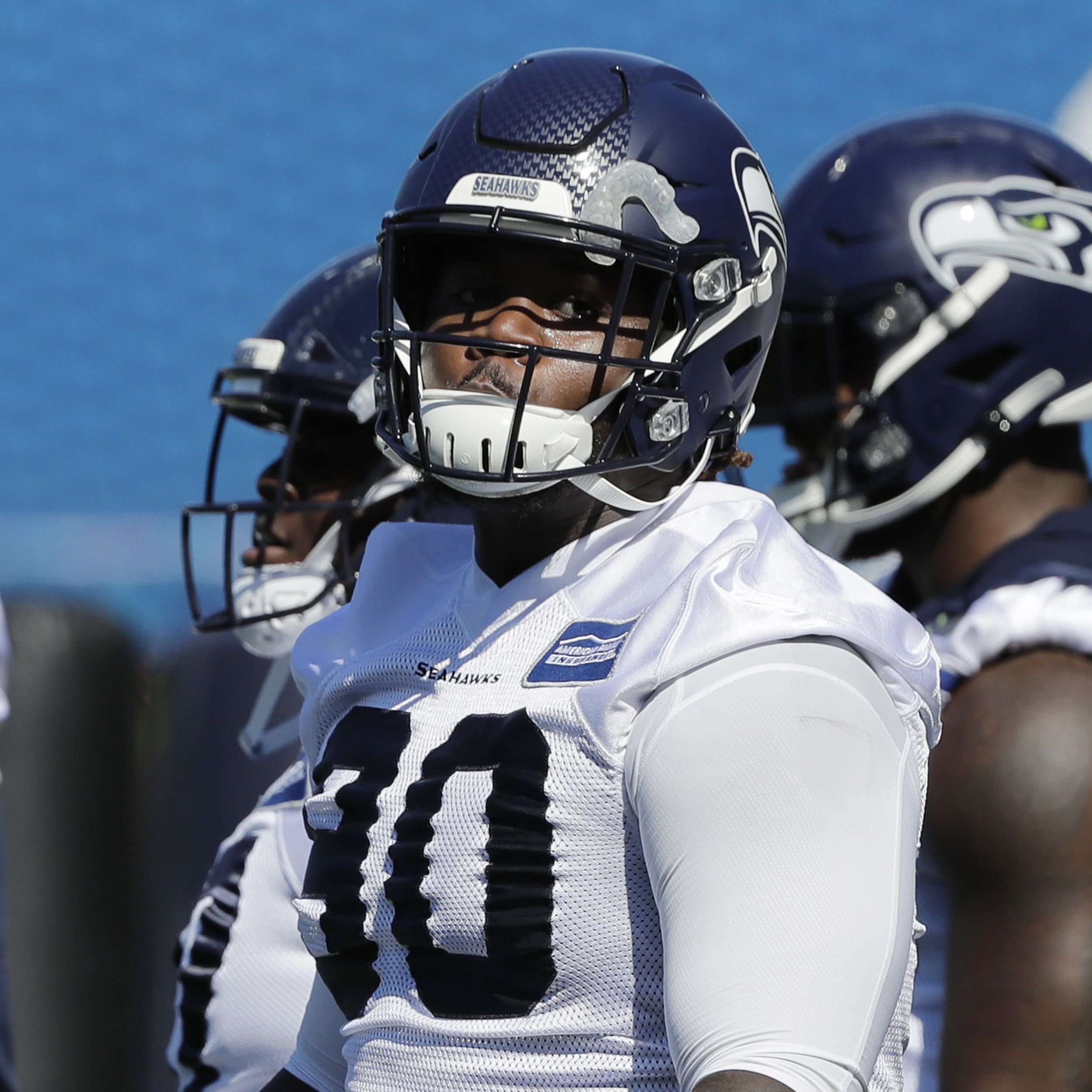 Seattle Seahawks defensive tackle Poona Ford runs through a drill