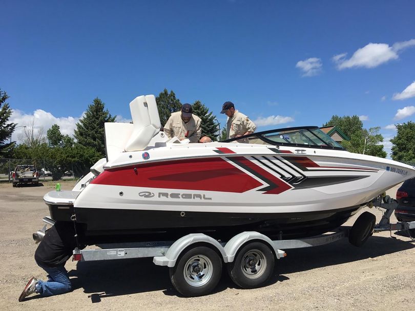 Inspectors at a Montana aquatic invasive species check station found invasive mussels encrusted on this boat over the Memorial Day holiday weekend.  (Montana Fish, Wildlilfe and Parks)