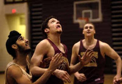 
University High senior Calvin Jurich, center,  watches for a rebound during a recent practice. 
 (Holly Pickett / The Spokesman-Review)