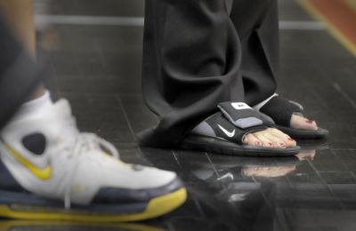 Summit head coach Jay Gahan and his assistant have the most unique footwear at the State 2B.  (CHRISTOPHER ANDERSON / The Spokesman-Review)