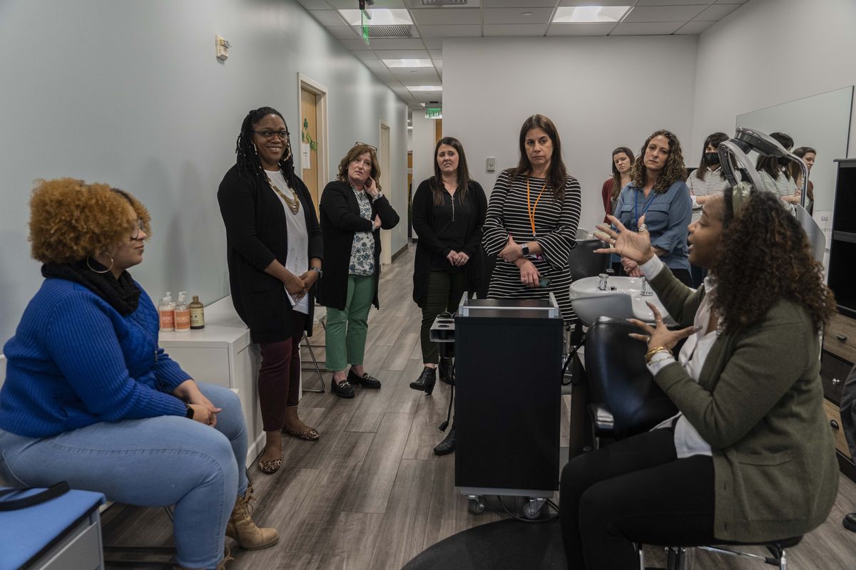 Tiffany Yizar, standing at left, is the director of Unilever's North America multicultural beauty technical center, in Trumbull, Conn., Thursday, March 2, 2023. Each week, the global conglomerate Unilever brings people into a salon to test new products. It's hoping to get a bigger piece of the long undervalued but growing Black beauty market. (Hiroko Masuike/The New York Times)  (HIROKO MASUIKE)