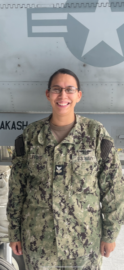 Spokane-raised Ashley Clifford, U.S. Navy Petty Officer 1st Class, is among a crew maintaining the F/A-18E/F Super Hornet, two of which will be in the Super Bowl pregame flyover.  (Courtesy)