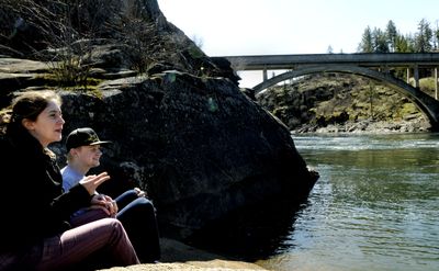 Madelyne Perman  and  Flynt Nash spent part of their day off together on the Spokane River at Falls Park in Post Falls on Friday. “This is just beautiful,” Perman said.   (Kathy Plonka / The Spokesman-Review)