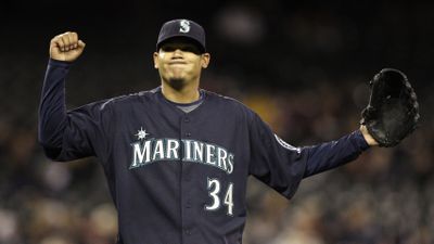 Felix Hernandez leaves field upset after giving up two-run HR in 6th. (Associated Press / The Spokesman-Review)