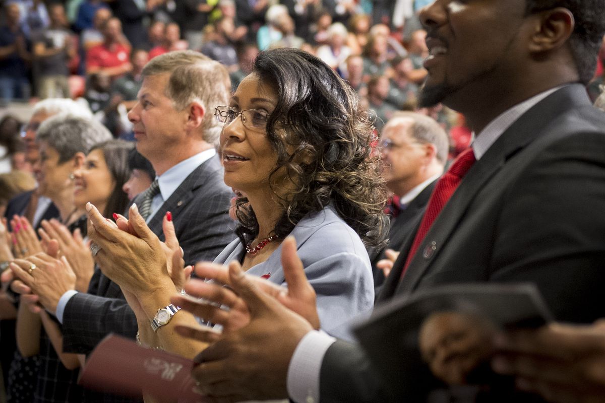 Carmento Floyd, widow of former WSU President Elson Floyd, sings the WSU fight song at the end of the memorial for her husband. (Colin Mulvany)