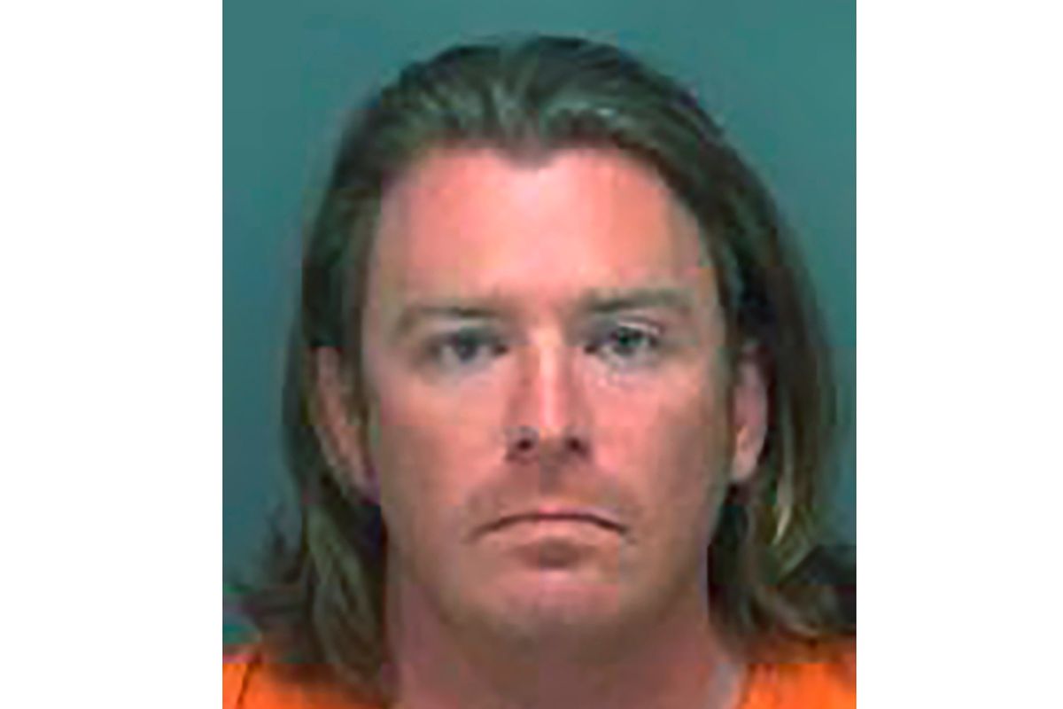 FILE – This photo made available on Jan. 8, 2020 by the Pinellas County, Fla., Sheriff’s Office shows Adam Johnson of Parrish, Fla. The Florida man was photographed carrying a lectern belonging to House Speaker Nancy Pelosi’s office at the U.S. Capitol during the Jan. 6 insurrection. (HOGP)