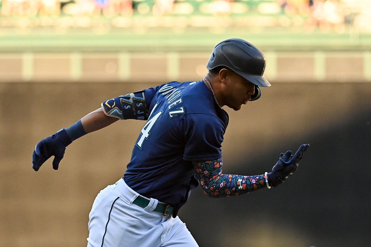 Julio Rodriguez of the Seattle Mariners celebrates his solo home run in the first inning against the Texas Rangers at T-Mobile Park on Tuesday, July 26, 2022, in Seattle.  (Tribune News Service)