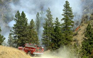 Hundreds of firefighters from throughout the region responded to the wildfire near Lake Chelan on Wednesday. (Colin Mulvany / The Spokesman-Review)