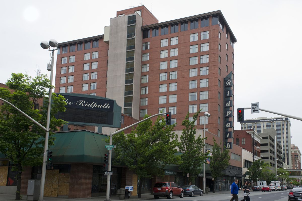 After several inspections, the city is demanding that the owners of the decrepit Ridpath Hotel building clean up the property.