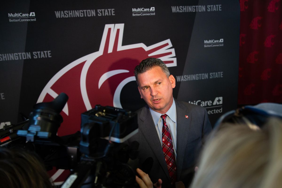 Kyle Smith speaks to media during a press conference in Washington State University