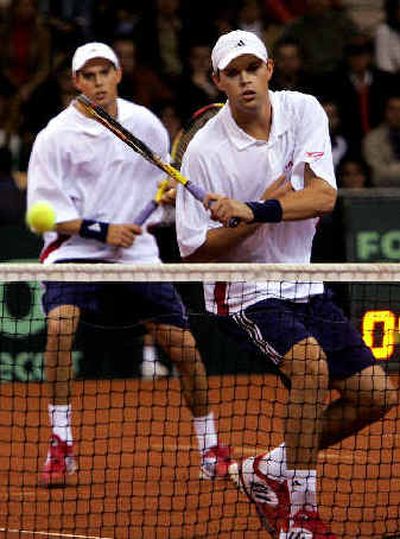 
Mike Bryan, left, and his twin brother Bob gave the United States a glimmer of hope with a win in the Davis Cup. 
 (Associated Press / The Spokesman-Review)