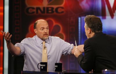 Jim Cramer, left, host of “Mad Money” on CNBC, talks with Jon Stewart during an interview Thursday on Comedy Central’s “The Daily Show.”  (Associated Press / The Spokesman-Review)