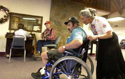 
Volunteer Elisabeth O'Meara, right, chats with John LeMon while they dance together at the Evergreen Sandpoint Assisted Living in Sandpoint. Behind, Betty Endress and Harold Overland play old-time music for the dance. O'Meara was chosen to be honored at the Women Honoring Women event coming up in Sandpoint. Volunteer Elisabeth O'Meara, right, chats with John LeMon while they dance together at the Evergreen Sandpoint Assisted Living in Sandpoint. Behind, Betty Endress and Harold Overland play old-time music for the dance. O'Meara was chosen to be honored at the Women Honoring Women event coming up in Sandpoint. 
 (Jesse Tinsley/Jesse Tinsley/ / The Spokesman-Review)