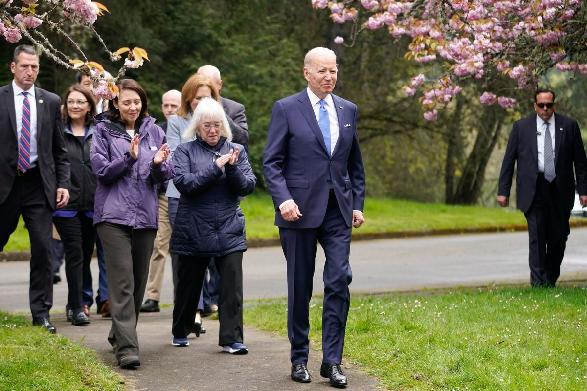 President Joe Biden arrives with Sen. Patty Murray, D-Wash., and Sen. Maria Cantwell, D-Wash., to speak at Seward Park on Earth Day, Friday, April 22, 2022, in Seattle. (AP Photo/Andrew Harnik) ORG XMIT: WAAH404  (Andrew Harnik)
