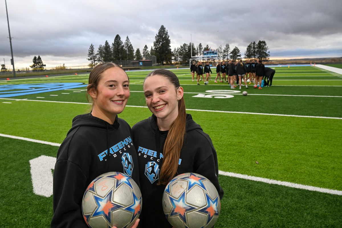 Freeman soccer players Rylee Russell, left, and Aubree Gregory pause for a portrait before heading to practice at Freeman High School on Monday.  (Jesse Tinsley/THE SPOKESMAN-REVI)