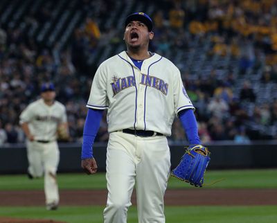 Seattle Mariners pitcher Felix Hernandez celebrates after escaping a bases-loaded jam against the Tampa Bay Rays on June 3, 2018, at T-Mobile Park in Seattle.  (Ken Lambert/Seattle Times)