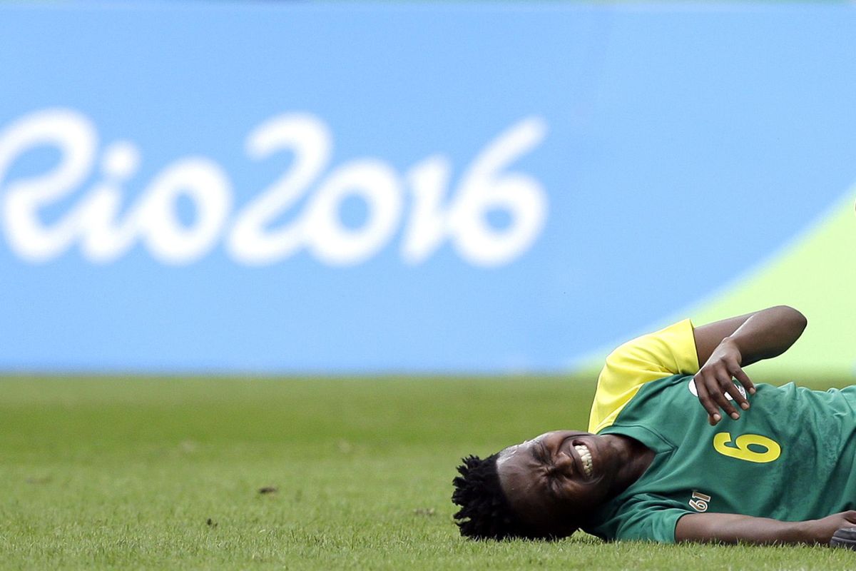 South Africa’s Mamello Makhabane grimaces in pain after being fouled during the opening match of the Women’s Olympic Football Tournament between Sweden and South Africa at the Rio Olympic Stadium in Rio de Janeiro, Brazil, Wednesday, Aug. 3, 2016. (Leo Correa / Associated Press)