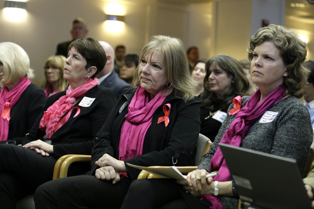 A group of people supporting a bill that would eliminate Washington’s  rule allowing transgender people use gender-segregated bathrooms and locker rooms in public buildings consistent with their gender identity listen to testimony during a public hearing, Wednesday, Jan. 27, 2016, in a Washington Senate hearing room at the Capitol in Olympia. (Ted S. Warren / Associated Press)